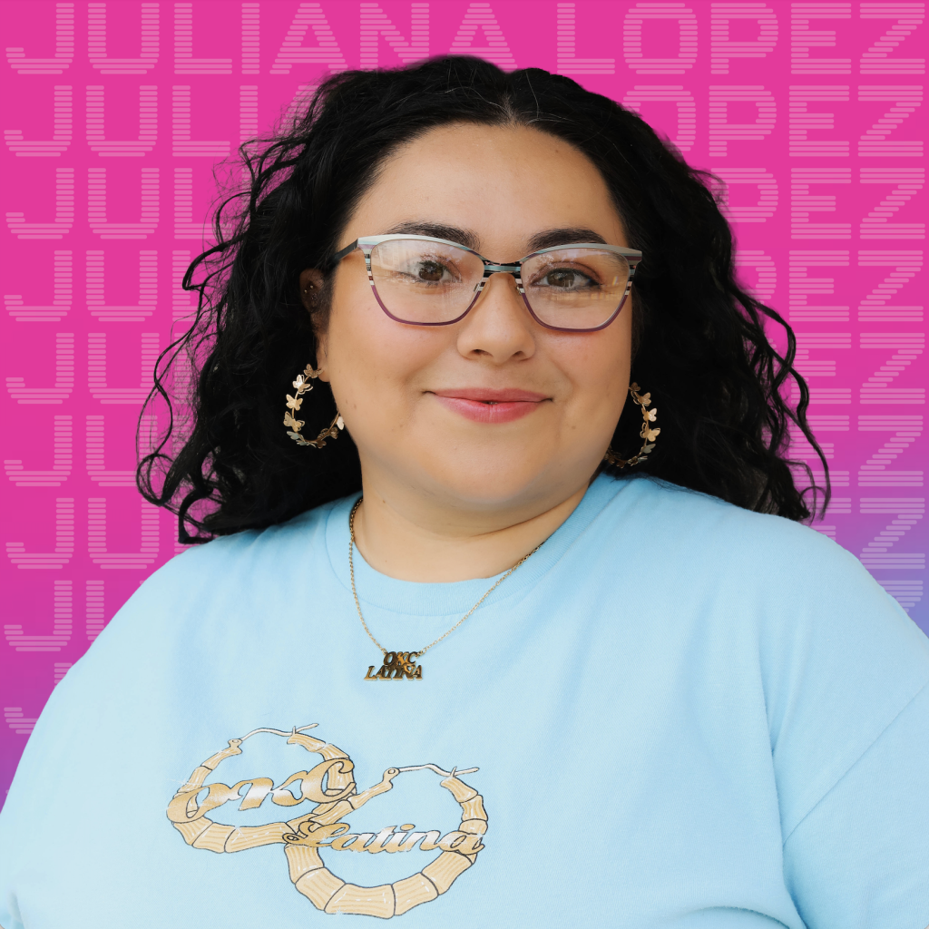 Woman in blue shirt with glasses on pink and purple background